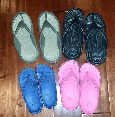 The Family Crocs Collection. Athens Size M4/W6 on top and Kids Baya Flip Size 12 and 1 on the bottom.